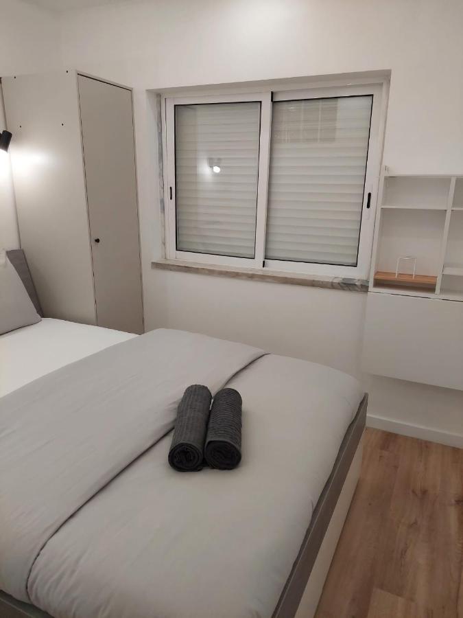 Lisbon South Bay Rooms Almada Bagian luar foto