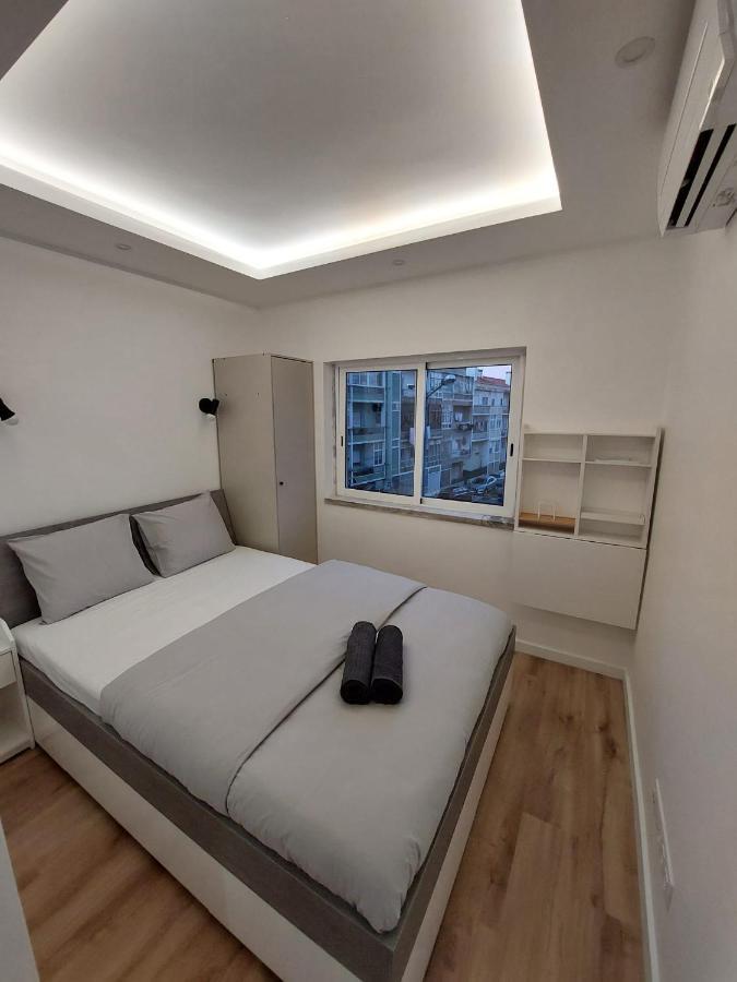 Lisbon South Bay Rooms Almada Bagian luar foto