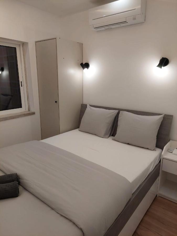 Lisbon South Bay Rooms Almada Bagian luar foto
