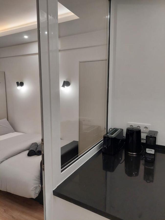 Lisbon South Bay Rooms Almada Bagian luar foto