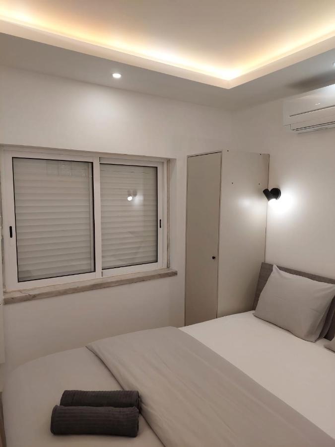 Lisbon South Bay Rooms Almada Bagian luar foto